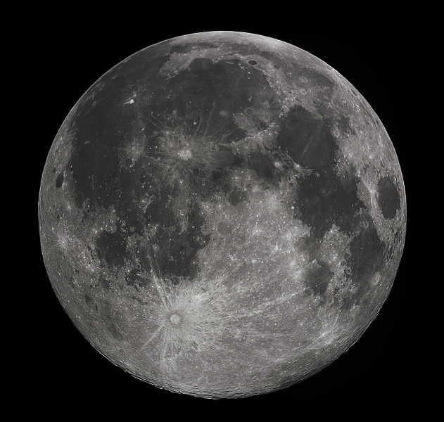 Near side of the moon, as seen through a telescope. The moon looks round, but it isn’t. In a dark sky, the moon looks bright white, but this image captures its true asphalt gray color. Notice that the moon’s near side has dark “maria” or “seas,” while the moon’s far side (photo at top of post) lacks these features. Image via Wikimedia Commons.